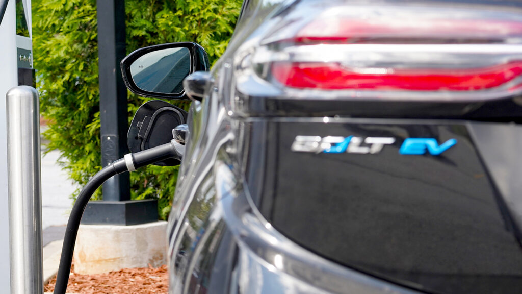 A Chevrolet Bolt electric vehicle (EV) at a charging station in Atlanta, Georgia, US, on Wednesday, Aug. 28, 2024. Election swing states and rural tribal
